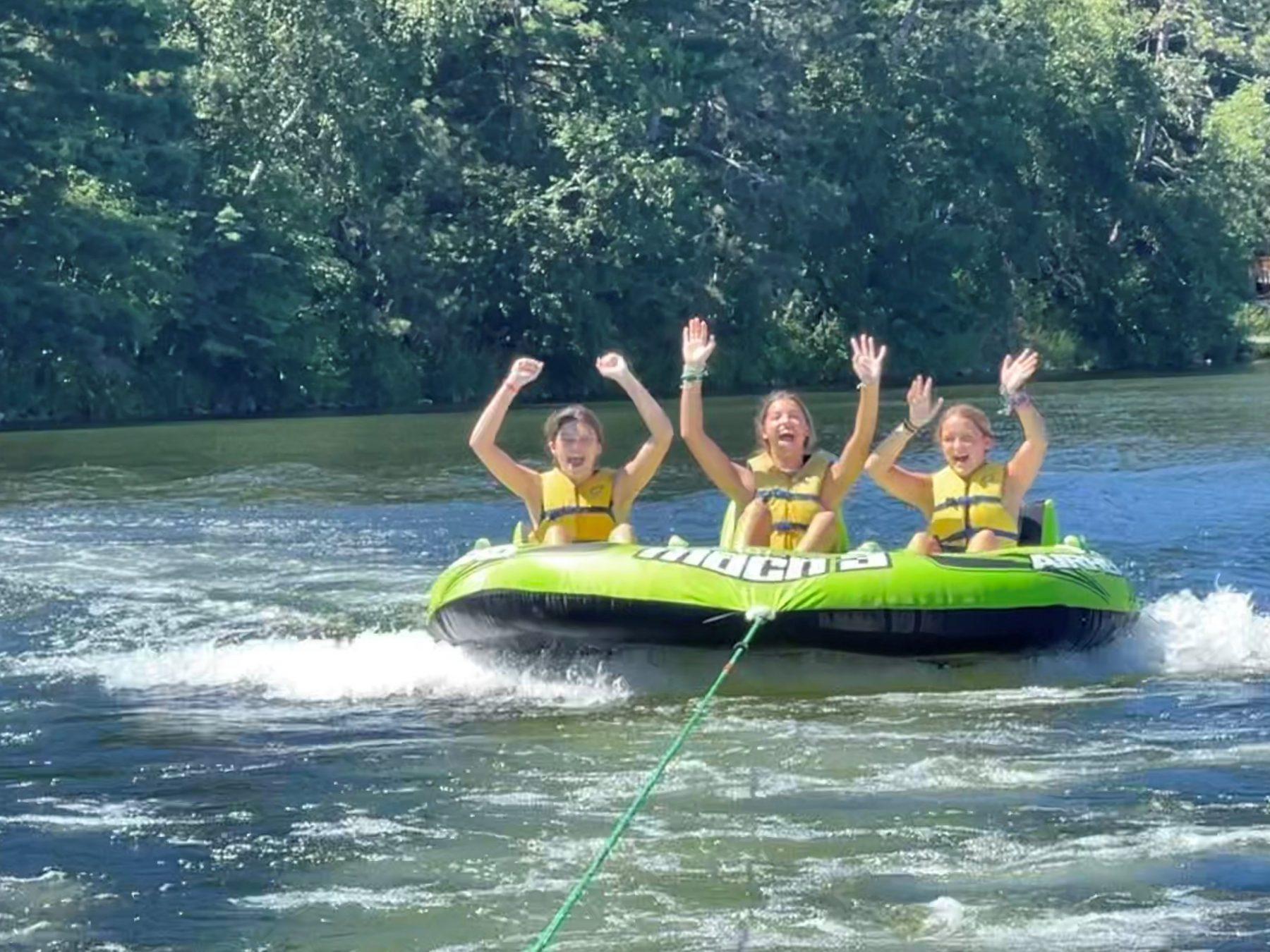 Girls on a raft at Kamaji summer camp