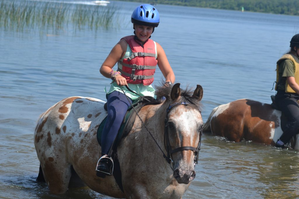 Horseback riding at a summer camp in Minnesota