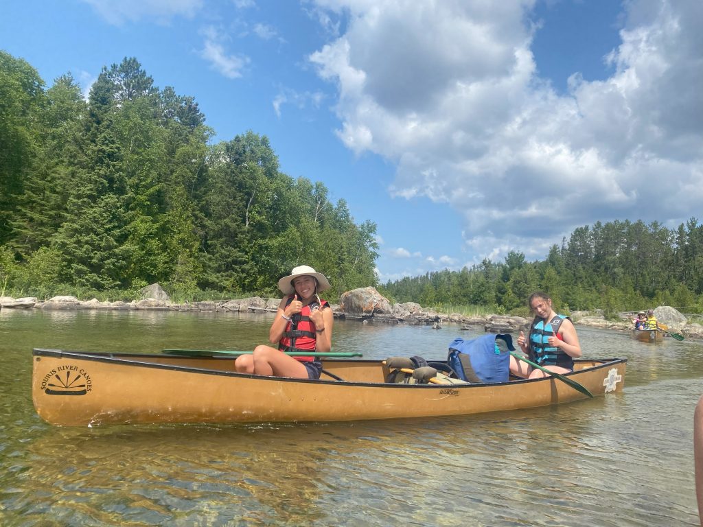 Campers canoeing at ACA accredited Camp Kamaji, in Minnesota