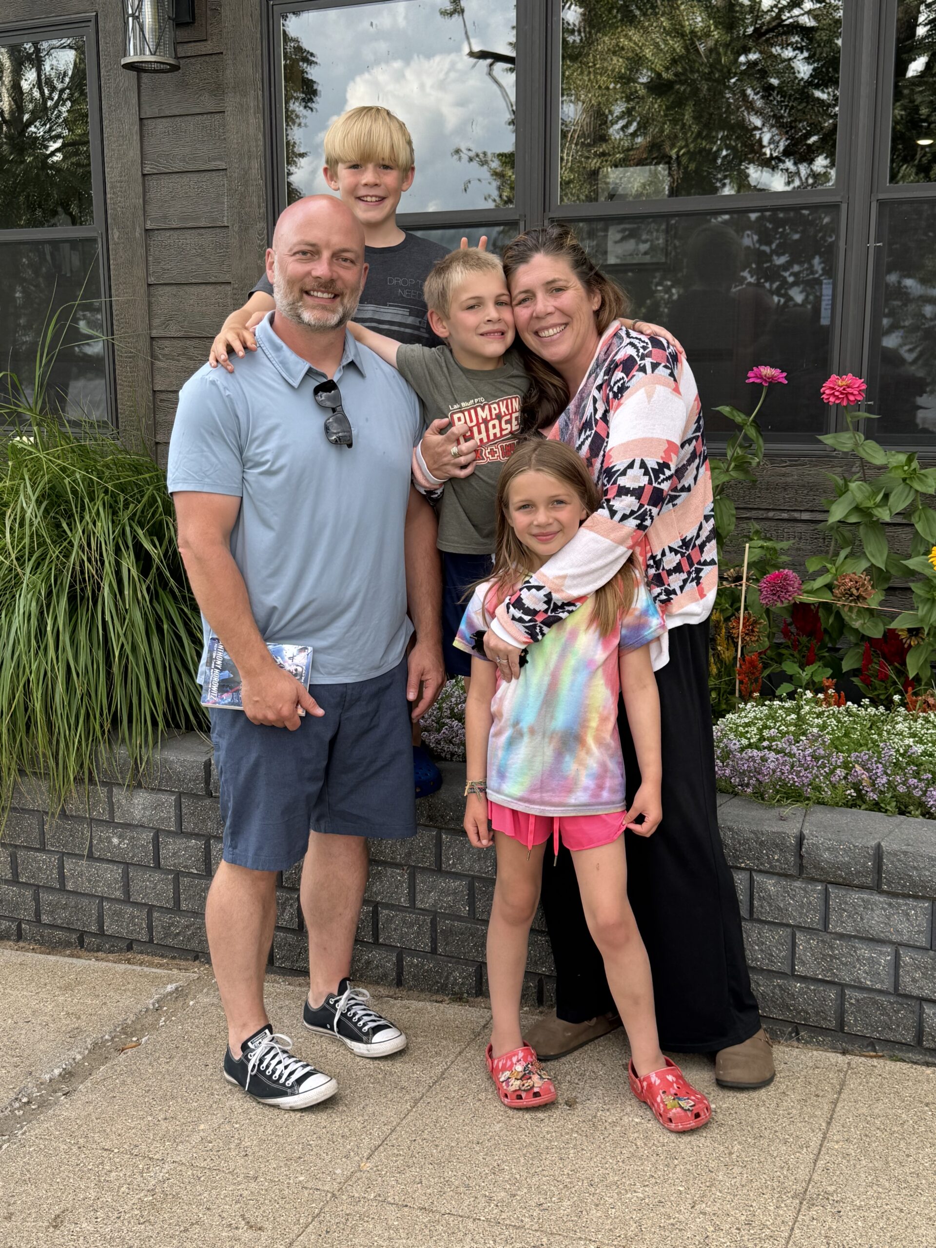 Directors of Kamaji, Minnesota: Kat and Jason with their family.